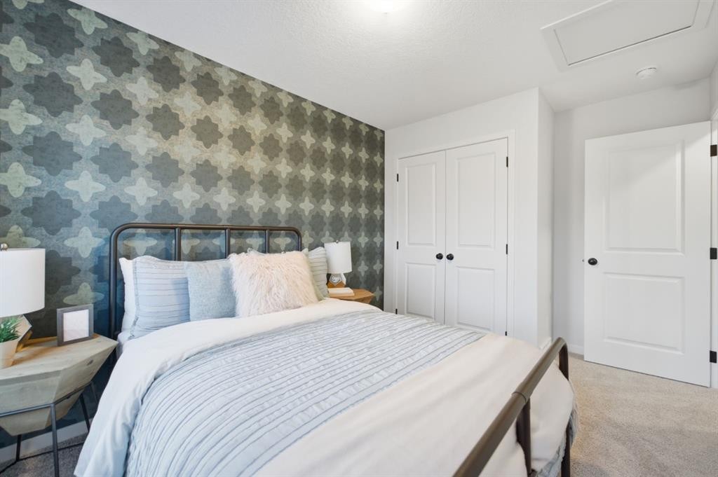 114 Wolf Creek Rise Se, Calgary, AB - Indoor Photo Showing Bedroom