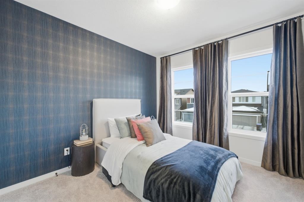 114 Wolf Creek Rise Se, Calgary, AB - Indoor Photo Showing Bedroom
