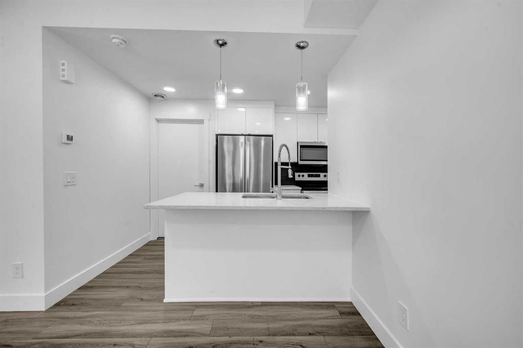 155 Savanna Walk Ne, Calgary, AB - Indoor Photo Showing Kitchen With Upgraded Kitchen