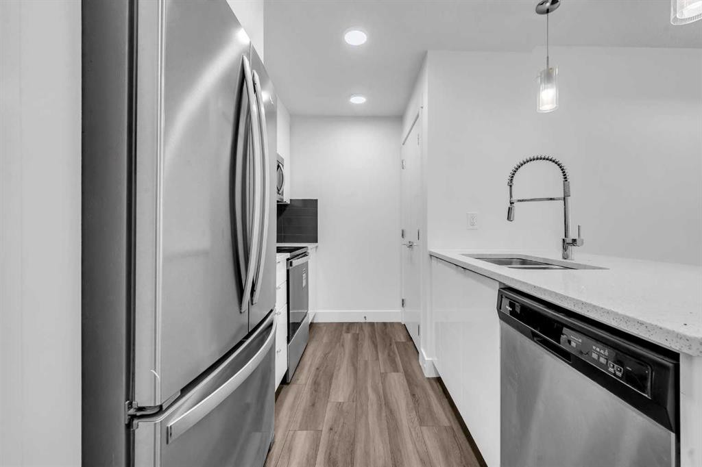 155 Savanna Walk Ne, Calgary, AB - Indoor Photo Showing Kitchen With Stainless Steel Kitchen With Double Sink With Upgraded Kitchen
