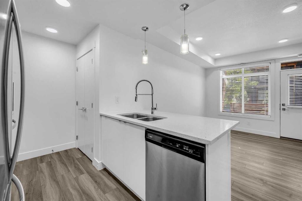 155 Savanna Walk Ne, Calgary, AB - Indoor Photo Showing Kitchen With Stainless Steel Kitchen With Double Sink With Upgraded Kitchen
