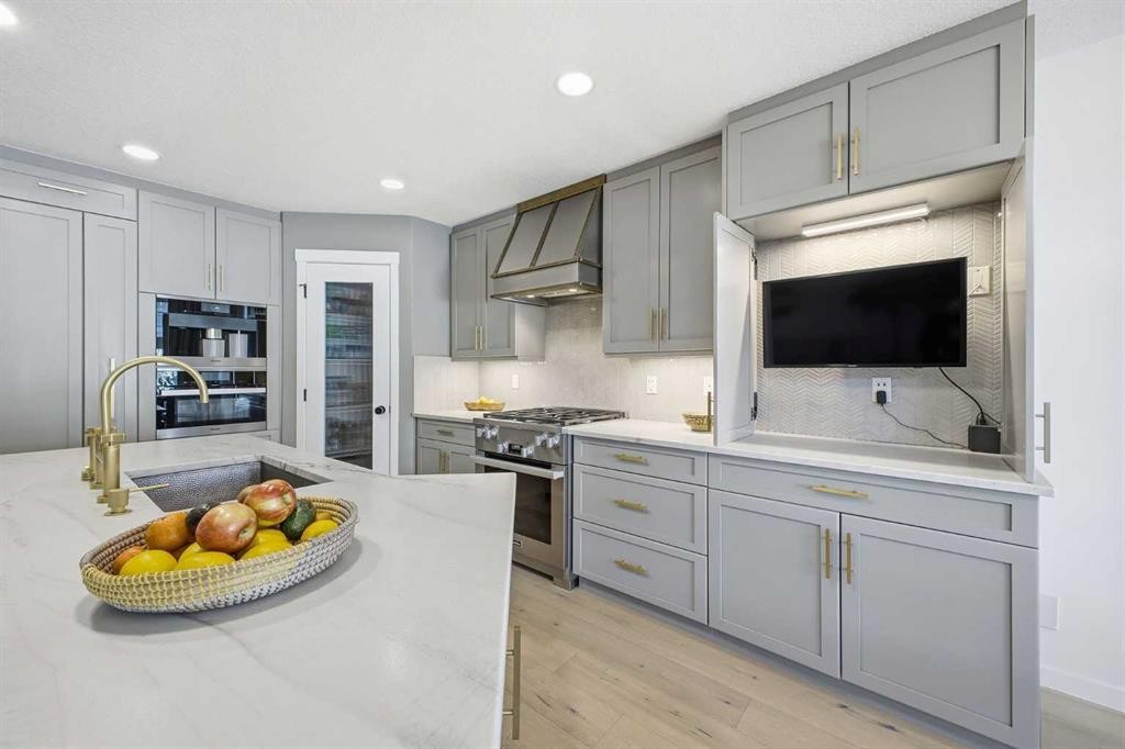 153 Cougarstone Common Sw, Calgary, AB - Indoor Photo Showing Kitchen With Upgraded Kitchen