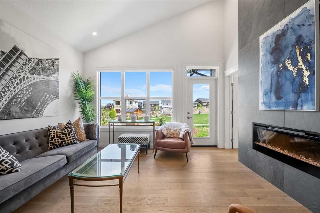 218 Mitchell Heath Nw, Calgary, AB - Indoor Photo Showing Living Room With Fireplace