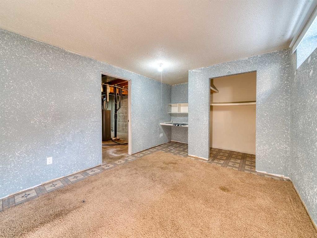 125-330 Canterbury Drive Sw, Calgary, AB - Indoor Photo Showing Other Room