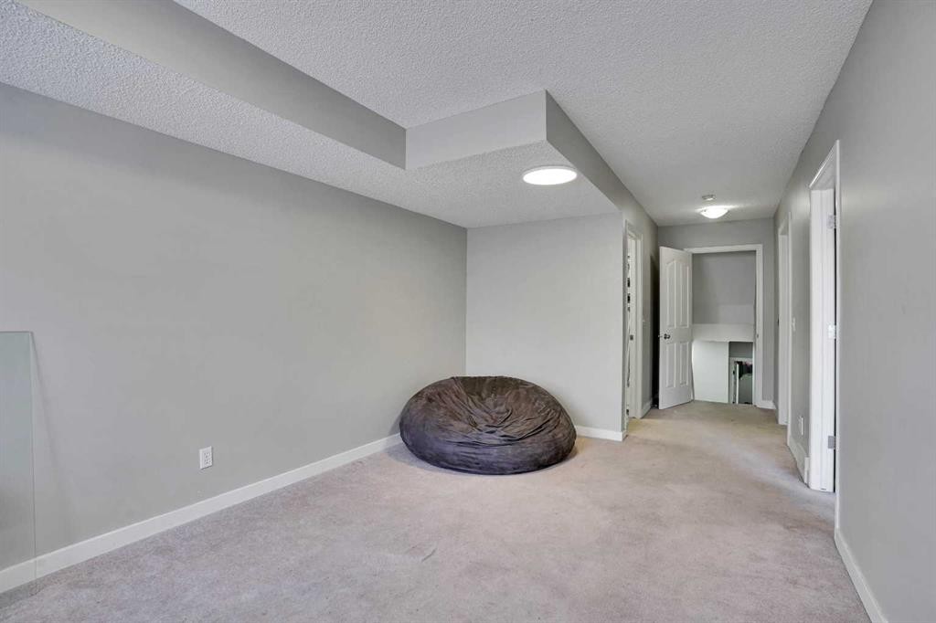 141 Saddlecrest Close Ne, Calgary, AB - Indoor Photo Showing Other Room