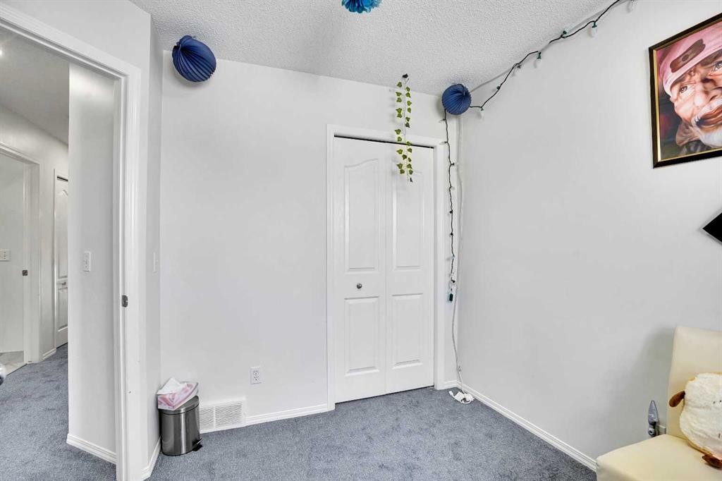 141 Saddlecrest Close Ne, Calgary, AB - Indoor Photo Showing Other Room