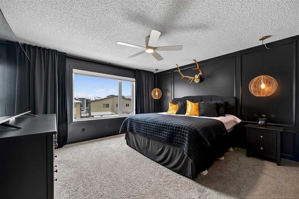 24 Walden Mount Se, Calgary, AB - Indoor Photo Showing Bedroom