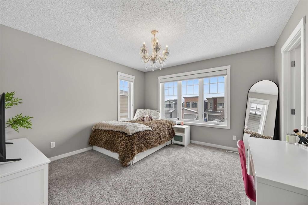 24 Walden Mount Se, Calgary, AB - Indoor Photo Showing Bedroom