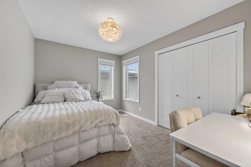 24 Walden Mount Se, Calgary, AB - Indoor Photo Showing Bedroom