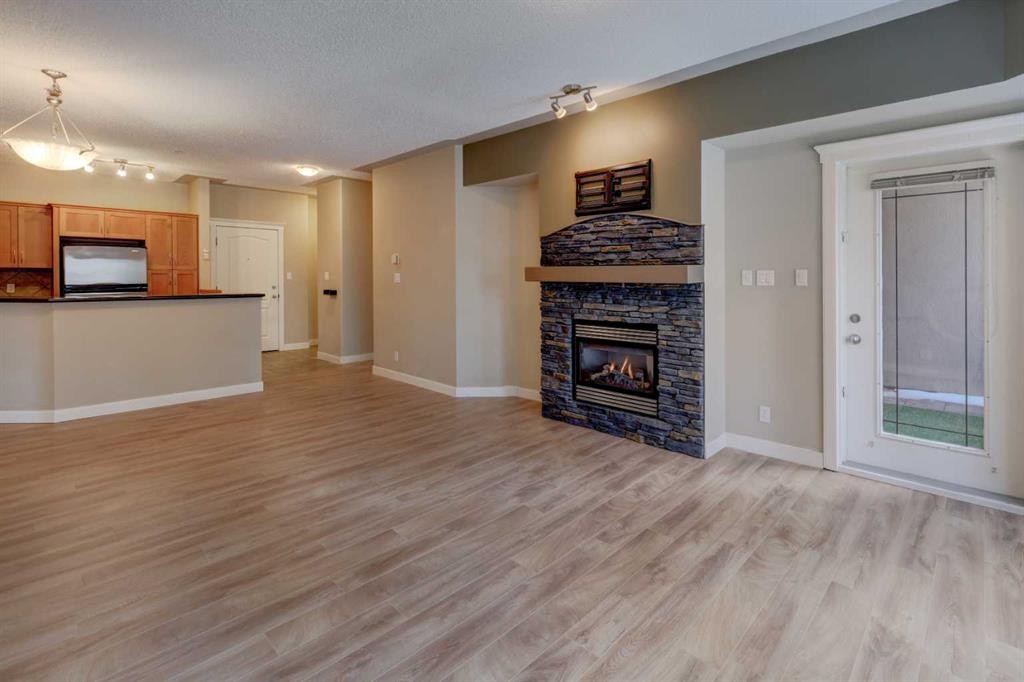 209-10 Discovery Ridge Close Sw, Calgary, AB - Indoor With Fireplace