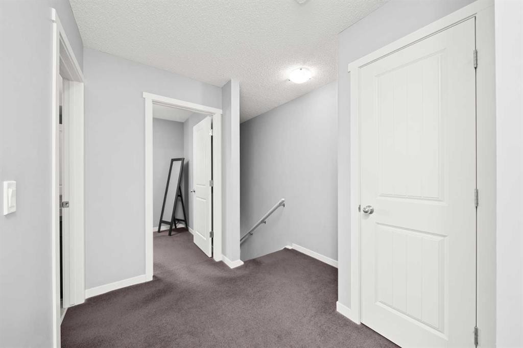 15 Copperpond Landing Se, Calgary, AB - Indoor Photo Showing Other Room