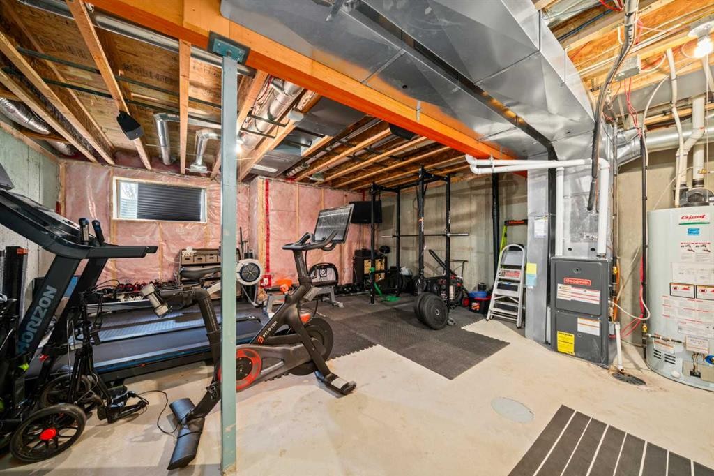 15 Copperpond Landing Se, Calgary, AB - Indoor Photo Showing Basement