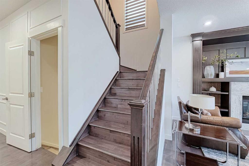 72 Sage Meadows Circle Nw, Calgary, AB - Indoor Photo Showing Other Room With Fireplace