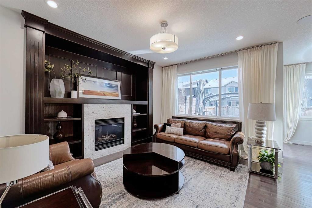 72 Sage Meadows Circle Nw, Calgary, AB - Indoor Photo Showing Living Room With Fireplace