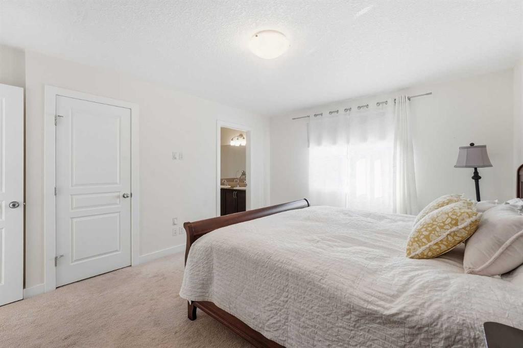 79 Cranford Green Se, Calgary, AB - Indoor Photo Showing Bedroom