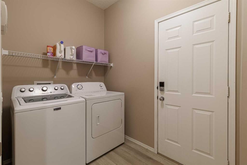 51 Brightondale Crescent Se, Calgary, AB - Indoor Photo Showing Laundry Room