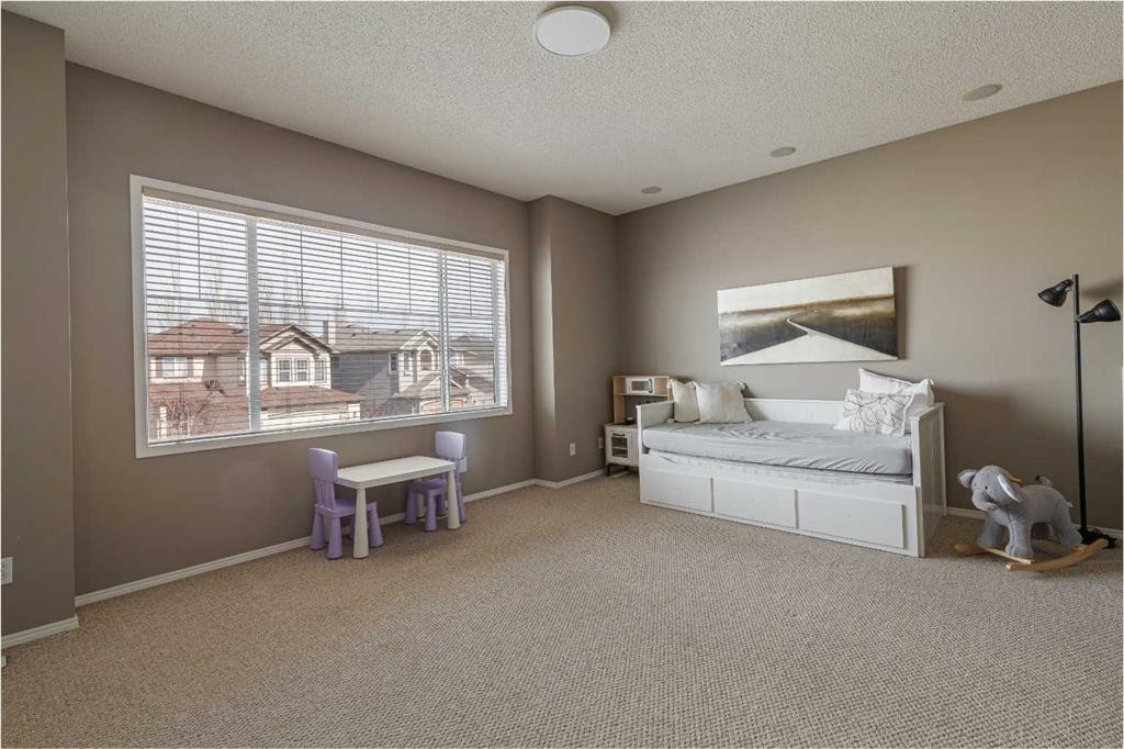 51 Brightondale Crescent Se, Calgary, AB - Indoor Photo Showing Bedroom