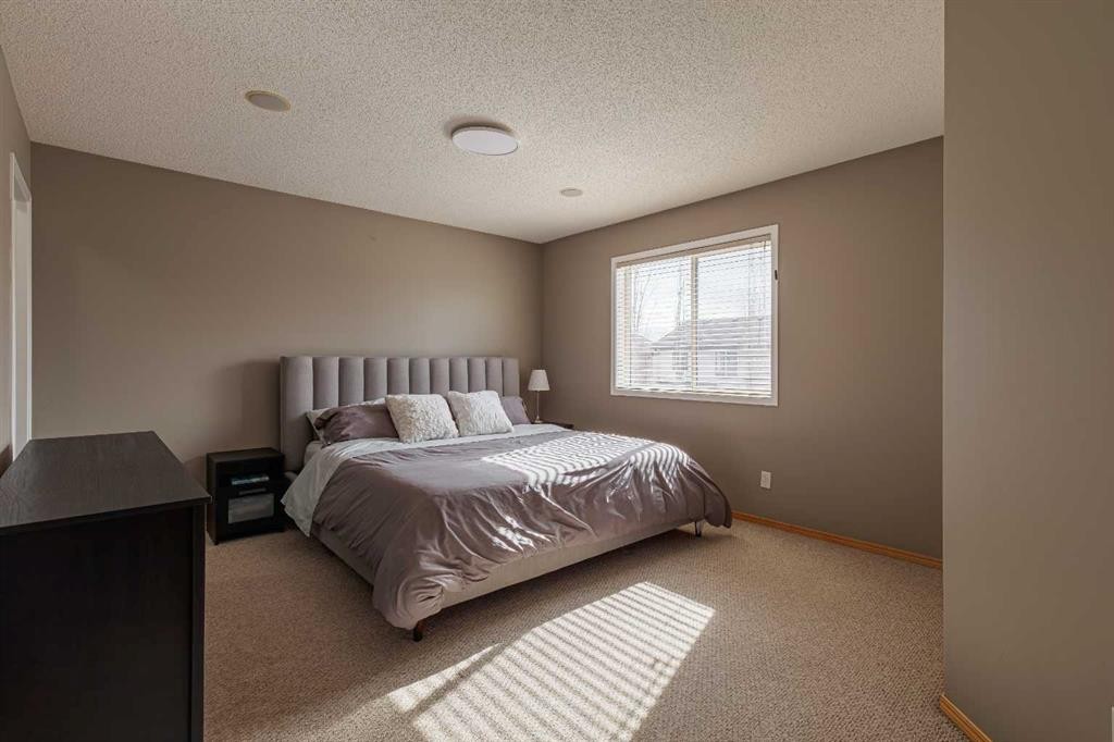 51 Brightondale Crescent Se, Calgary, AB - Indoor Photo Showing Bedroom