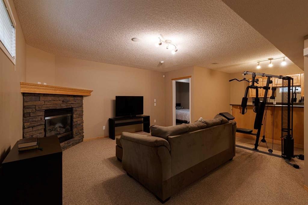 51 Brightondale Crescent Se, Calgary, AB - Indoor With Fireplace