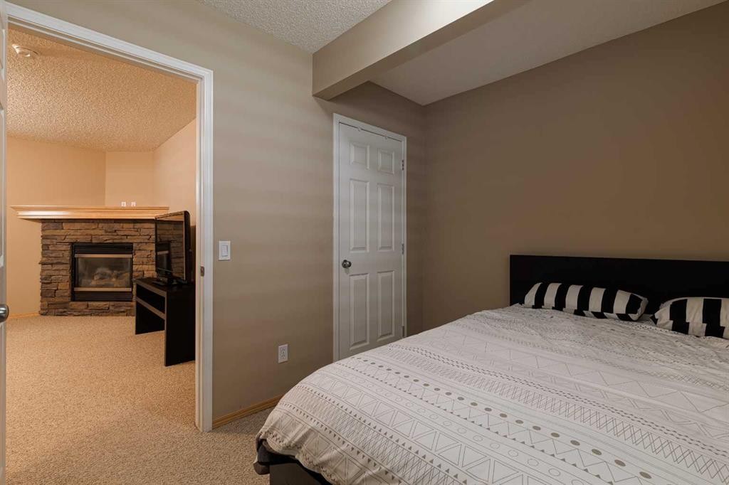 51 Brightondale Crescent Se, Calgary, AB - Indoor Photo Showing Bedroom