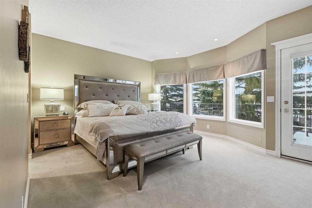 23 Prominence Point Sw, Calgary, AB - Indoor Photo Showing Bedroom