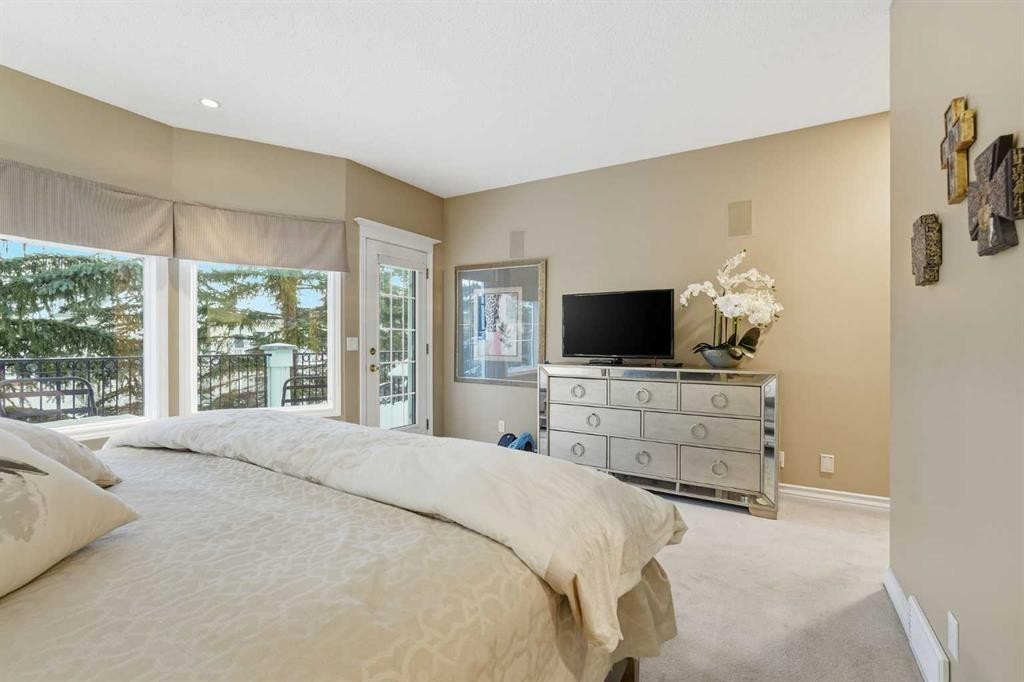 23 Prominence Point Sw, Calgary, AB - Indoor Photo Showing Bedroom