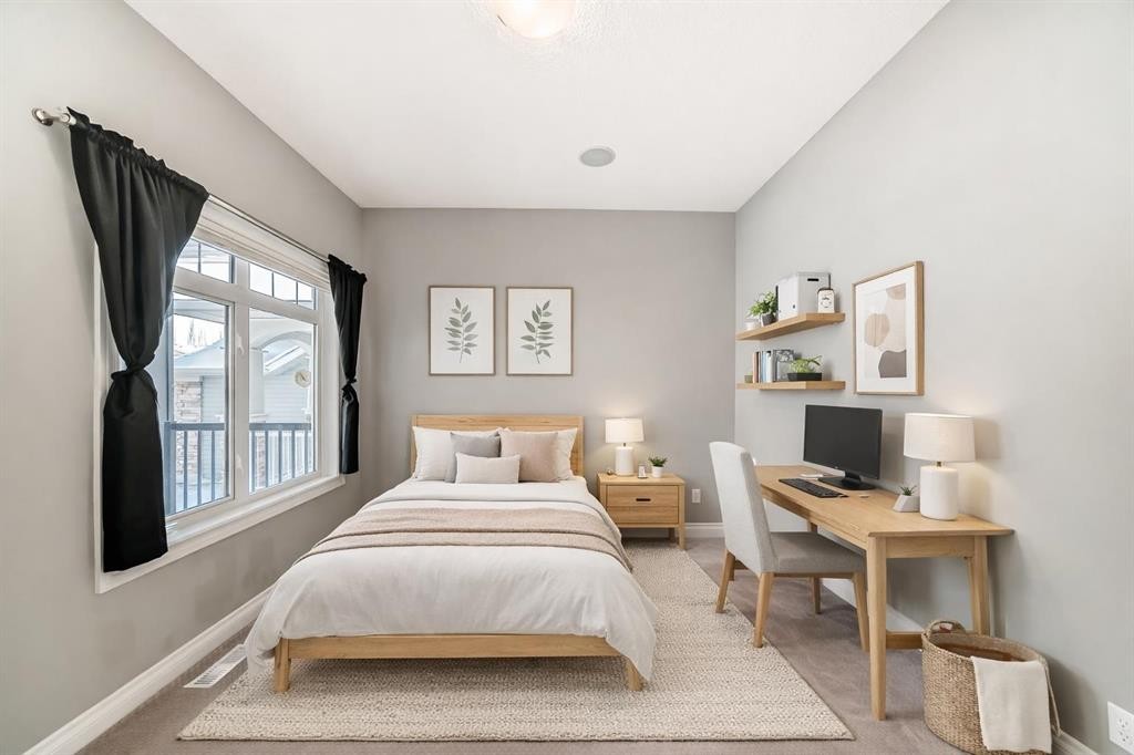 88 Sunset Circle, Cochrane, AB - Indoor Photo Showing Bedroom