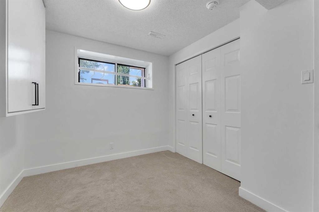 199 Cedardale Road Sw, Calgary, AB - Indoor Photo Showing Other Room