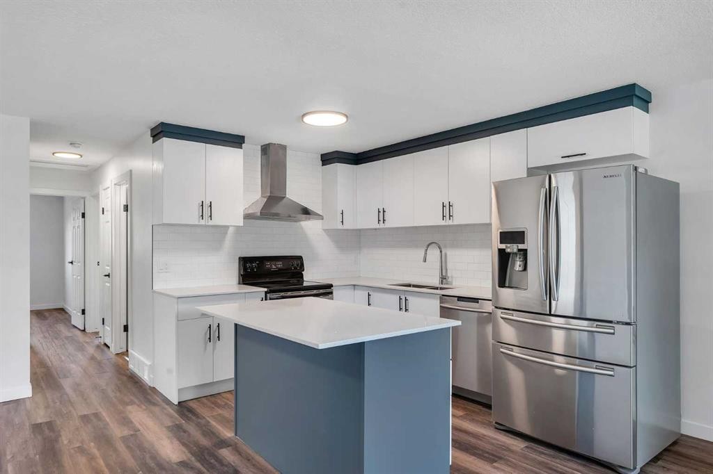 199 Cedardale Road Sw, Calgary, AB - Indoor Photo Showing Kitchen With Upgraded Kitchen