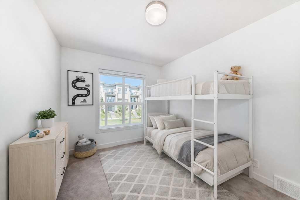 53 Spring Creek Common Sw, Calgary, AB - Indoor Photo Showing Bedroom