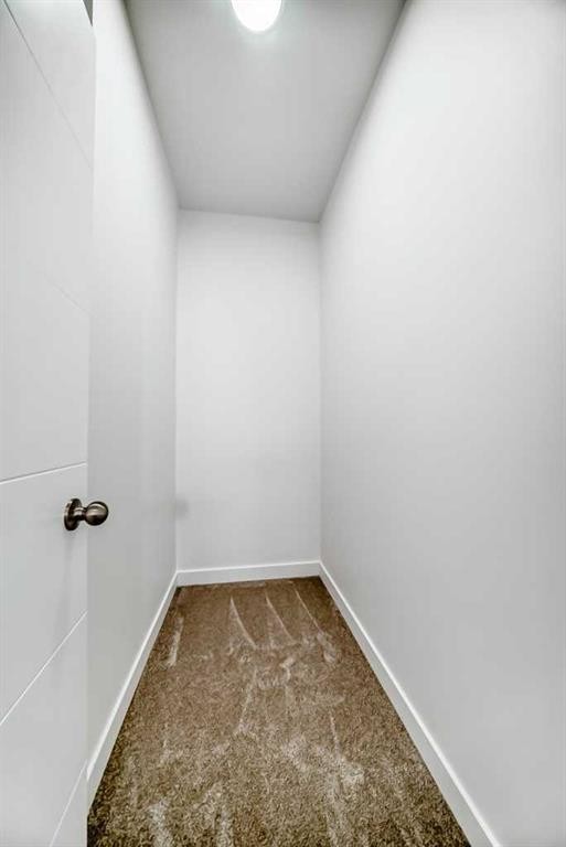53 Spring Creek Common Sw, Calgary, AB - Indoor Photo Showing Other Room