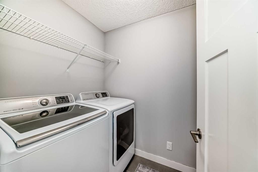 129 Lucas Crescent Nw, Calgary, AB - Indoor Photo Showing Laundry Room