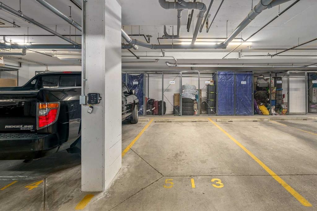 2406-200 Seton Circle Se, Calgary, AB - Indoor Photo Showing Garage