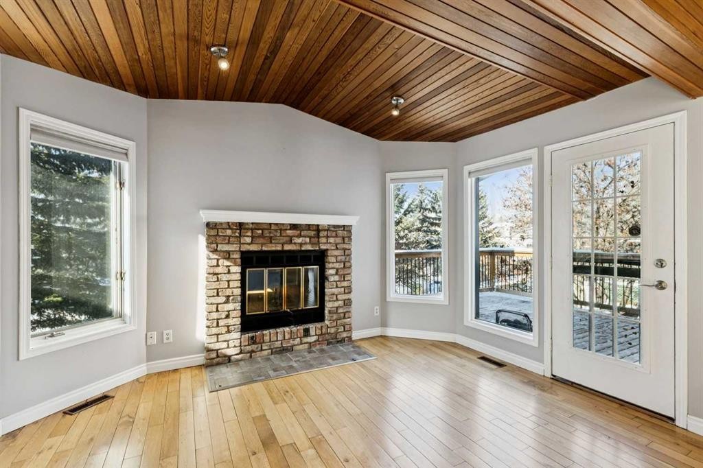 136 Scenic Acres Drive Nw, Calgary, AB - Indoor Photo Showing Living Room With Fireplace