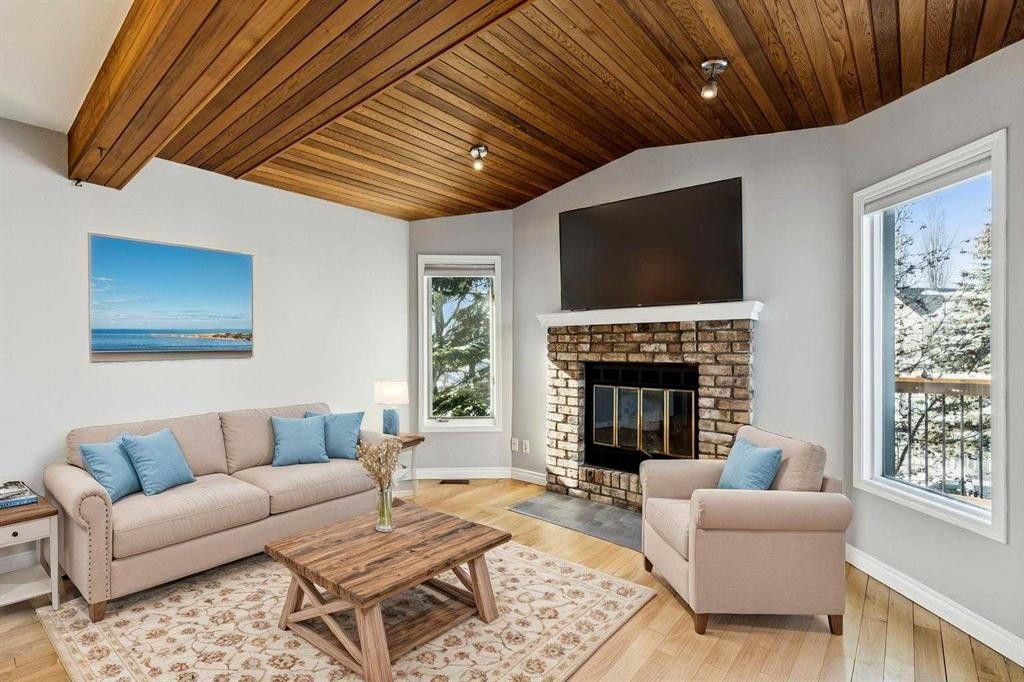 136 Scenic Acres Drive Nw, Calgary, AB - Indoor Photo Showing Living Room With Fireplace