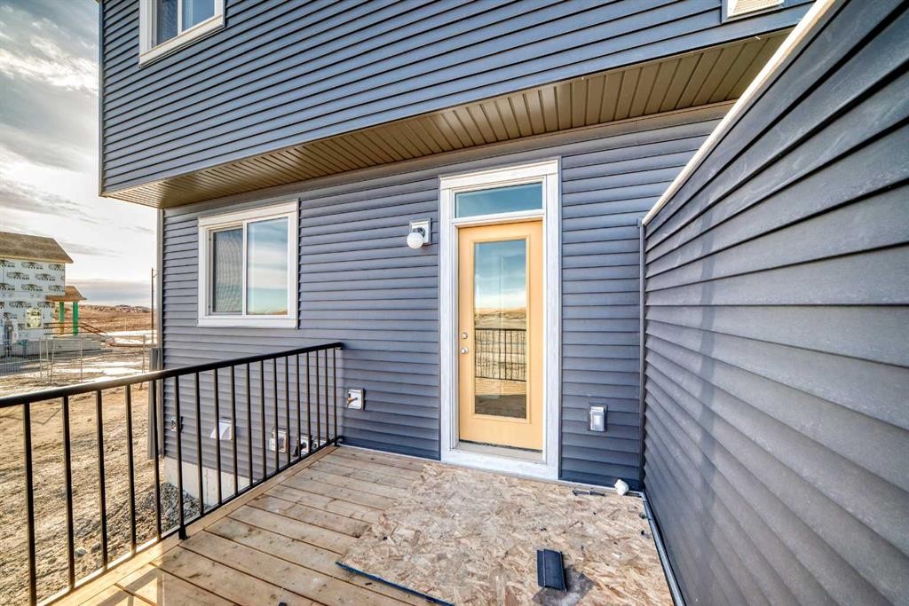 162 Lanark Gate Se, Airdrie, AB - Outdoor With Deck Patio Veranda With Exterior