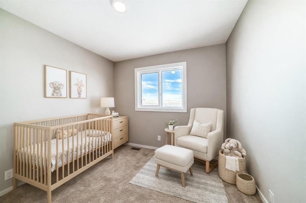 162 Lanark Gate Se, Airdrie, AB - Indoor Photo Showing Bedroom