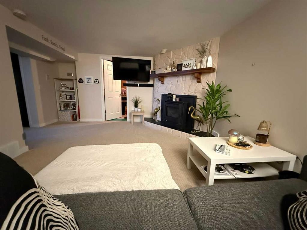 37 Arbour Crescent Se, Calgary, AB - Indoor With Fireplace