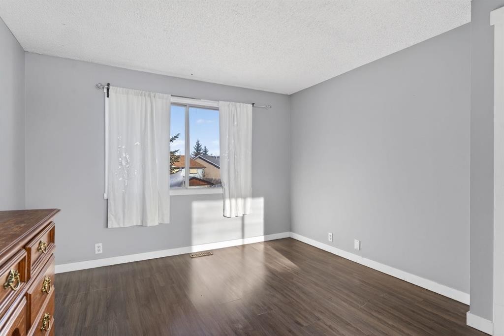 36 Falton Court Ne, Calgary, AB - Indoor Photo Showing Other Room
