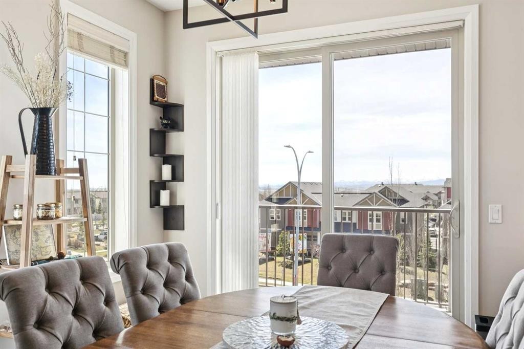2302-15 Sunset Square, Cochrane, AB - Indoor Photo Showing Dining Room
