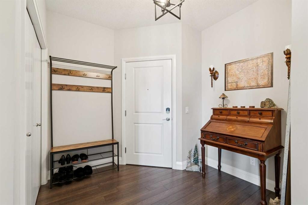 2302-15 Sunset Square, Cochrane, AB - Indoor Photo Showing Other Room