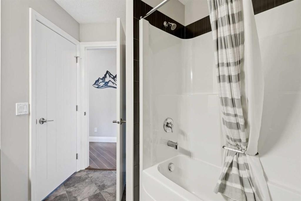 2302-15 Sunset Square, Cochrane, AB - Indoor Photo Showing Bathroom