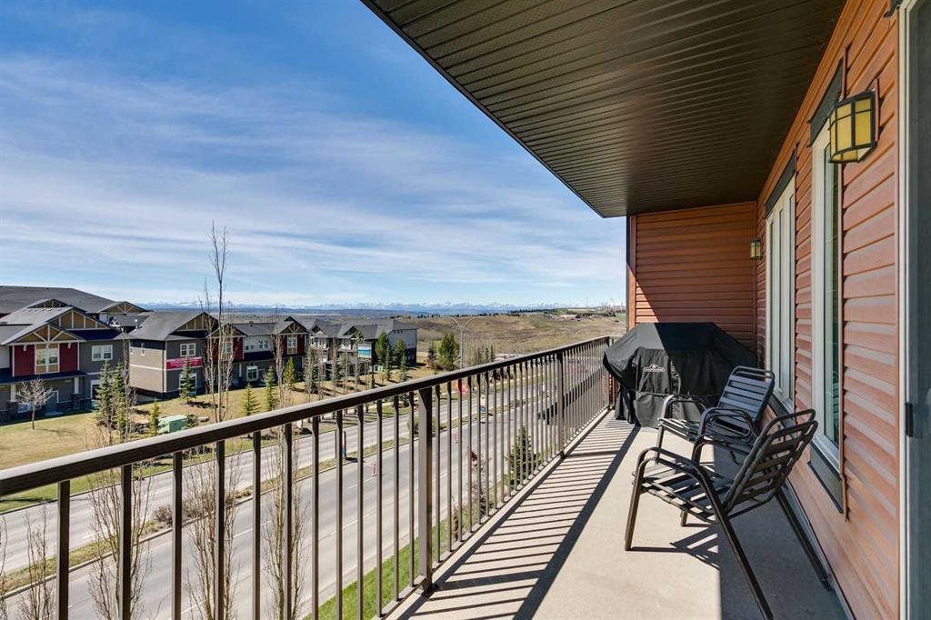 2302-15 Sunset Square, Cochrane, AB - Outdoor With Balcony With Exterior