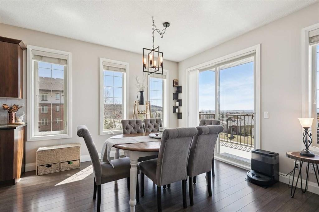 2302-15 Sunset Square, Cochrane, AB - Indoor Photo Showing Dining Room