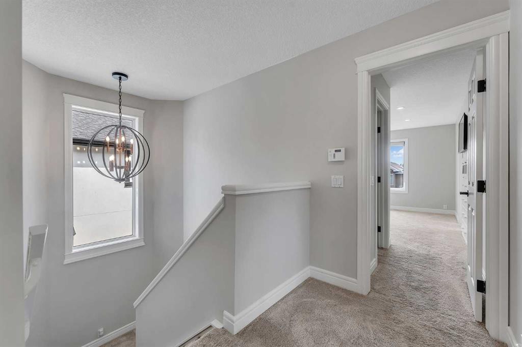 202 Coral Reef Manor Ne, Calgary, AB - Indoor Photo Showing Other Room