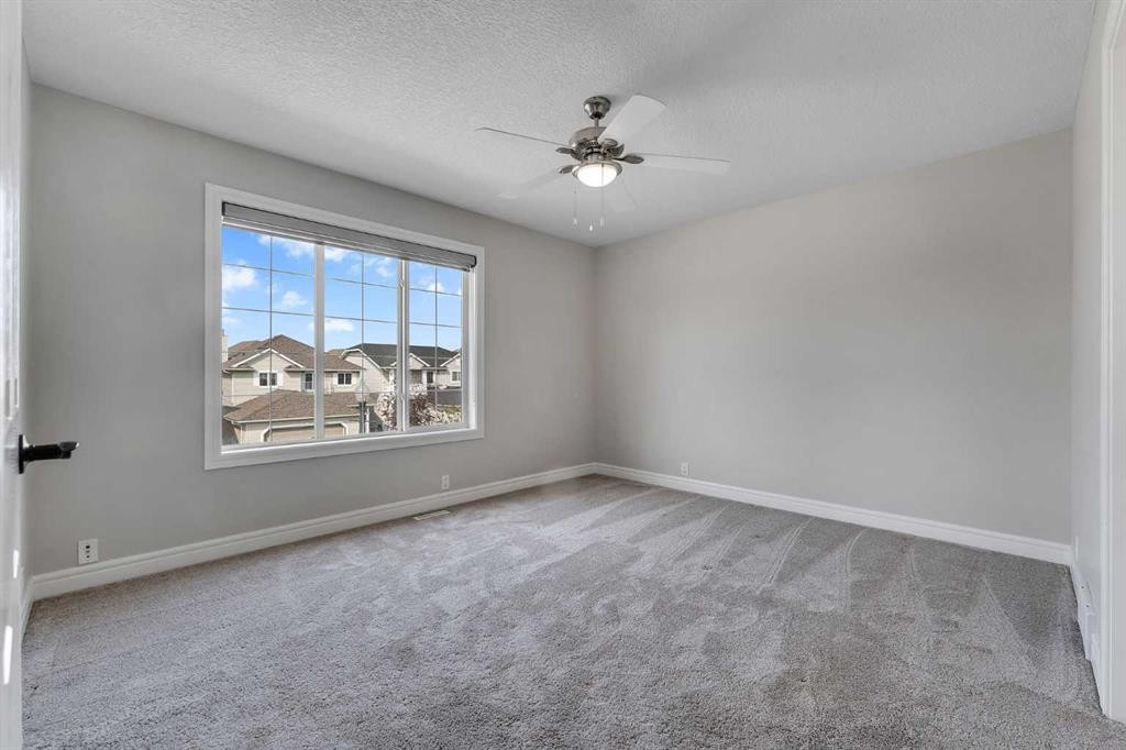 202 Coral Reef Manor Ne, Calgary, AB - Indoor Photo Showing Other Room