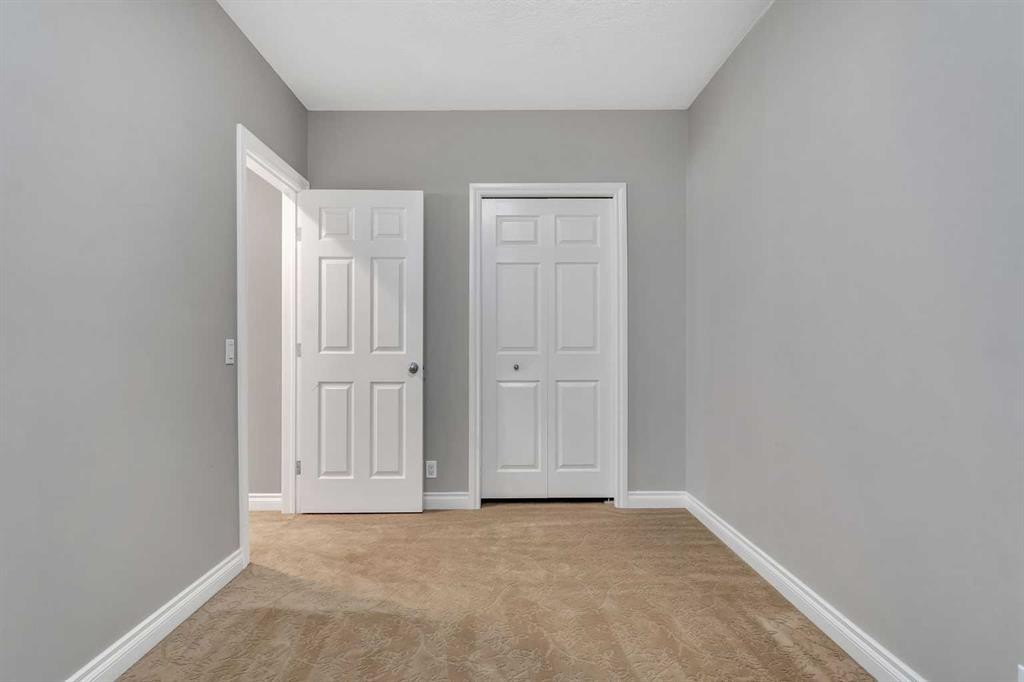 202 Coral Reef Manor Ne, Calgary, AB - Indoor Photo Showing Other Room