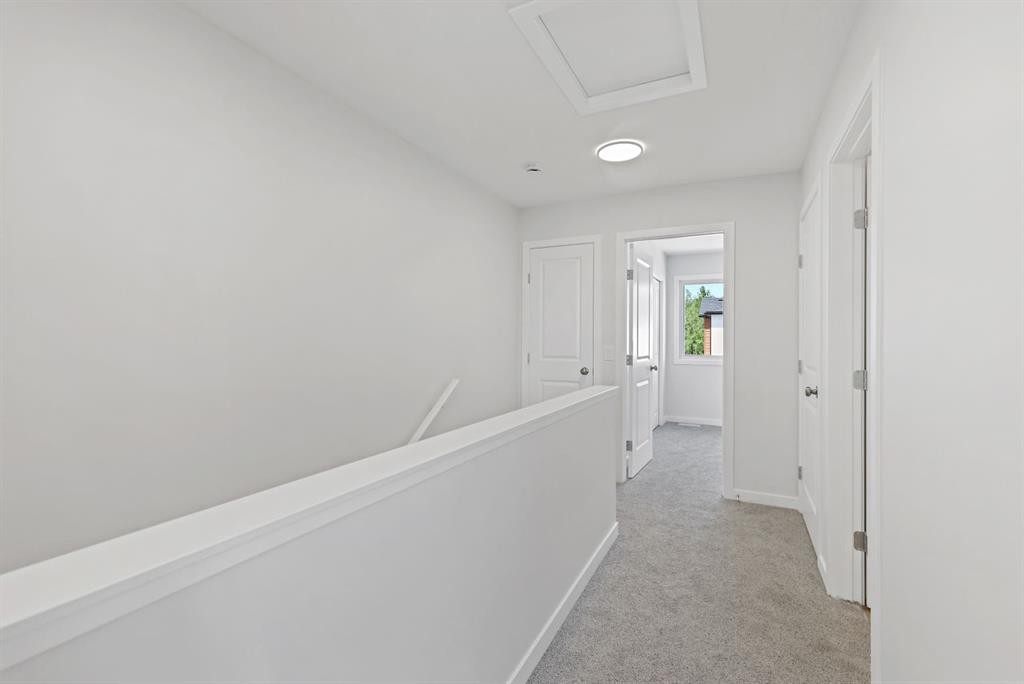 5 Valarosa Park, Didsbury, AB - Indoor Photo Showing Other Room