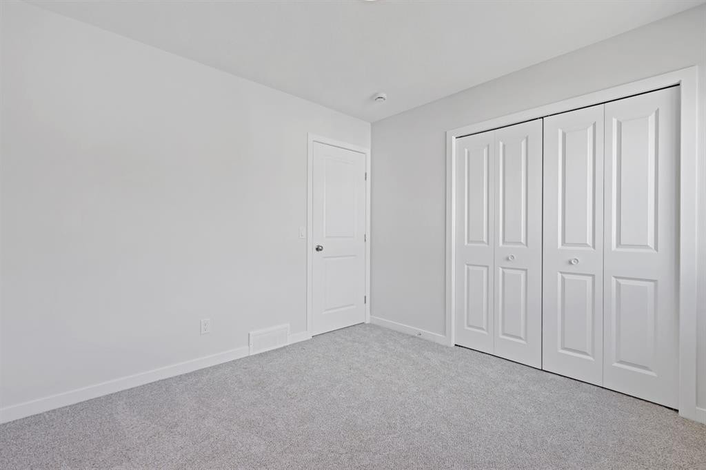 5 Valarosa Park, Didsbury, AB - Indoor Photo Showing Other Room