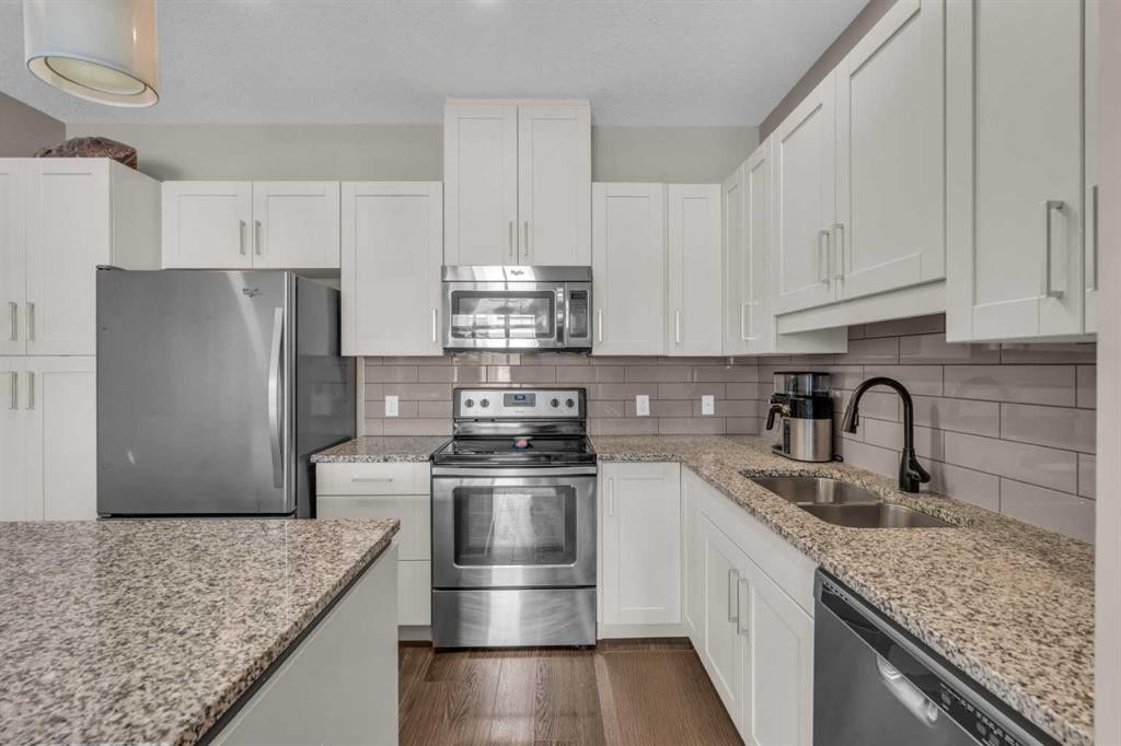 93 Copperstone Common Se, Calgary, AB - Indoor Photo Showing Kitchen With Stainless Steel Kitchen With Double Sink With Upgraded Kitchen